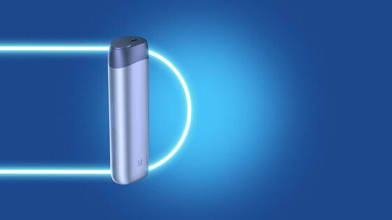 An IQOS ILUMA PRIME Holder and Pocket Charger in a box.