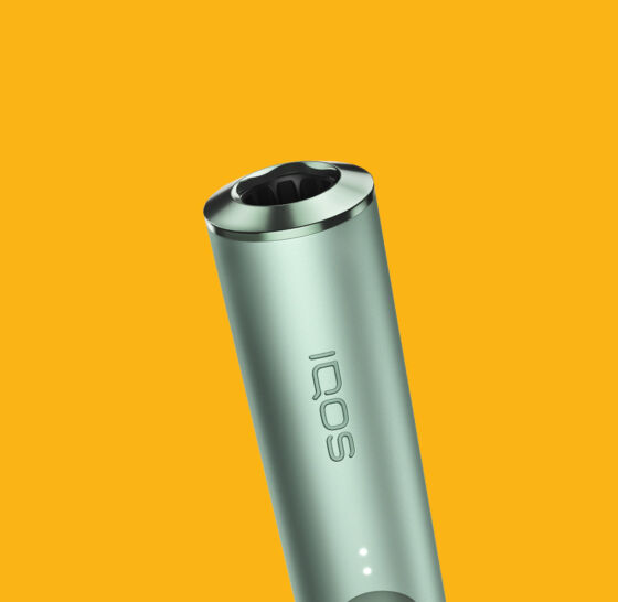 IQOS device in man's hands
