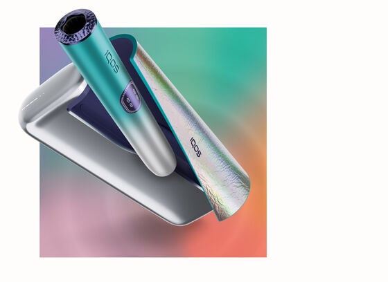 A moss green IQOS ILUMA device.